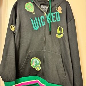 ✨ NEW WITH TAGS ✨
Official Wicked – Universal Studios zip-up hoodie